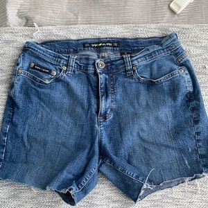 DKNY cut off dark blue jean shorts